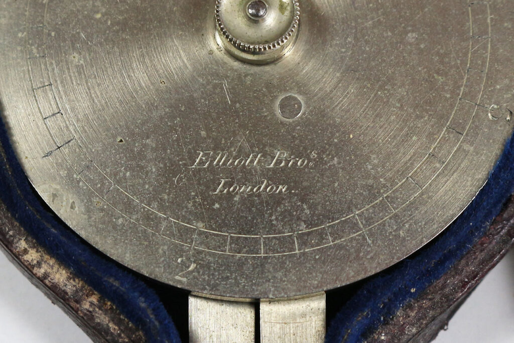 Elliott Bros electrum dial dividers signature detail