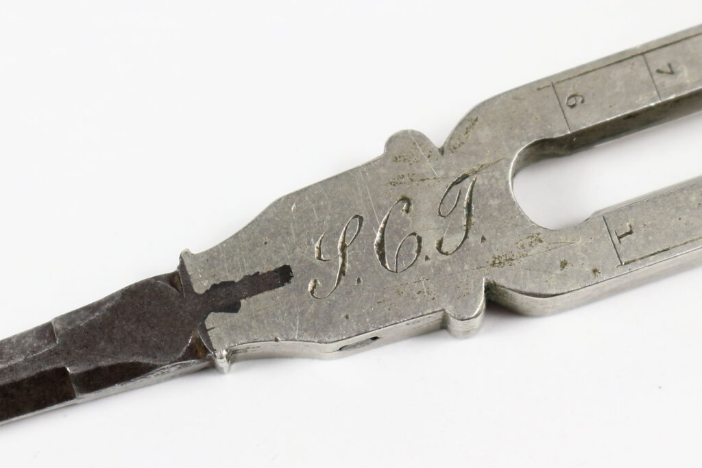 William Elliott Great Portland Street proportional dividers - detail of engraved SCT monogram in copperplate script capitals