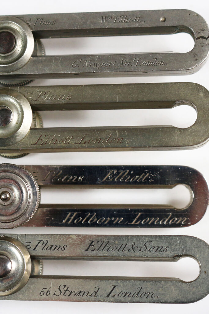 Comparison of four William Elliott proportional dividers signed "Gt. Newport Strt.", "Elliott London", "Elliott Holborn" and "Elliott & Sons 56 Strand, London"