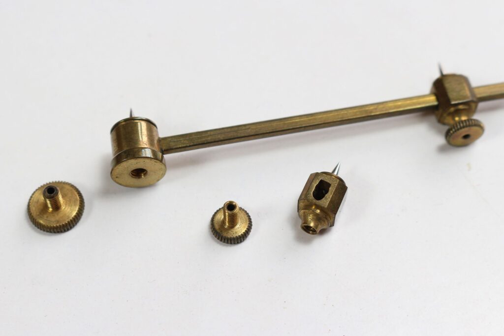 Unsigned beam instrument detail of trammels and hollow tightening nuts