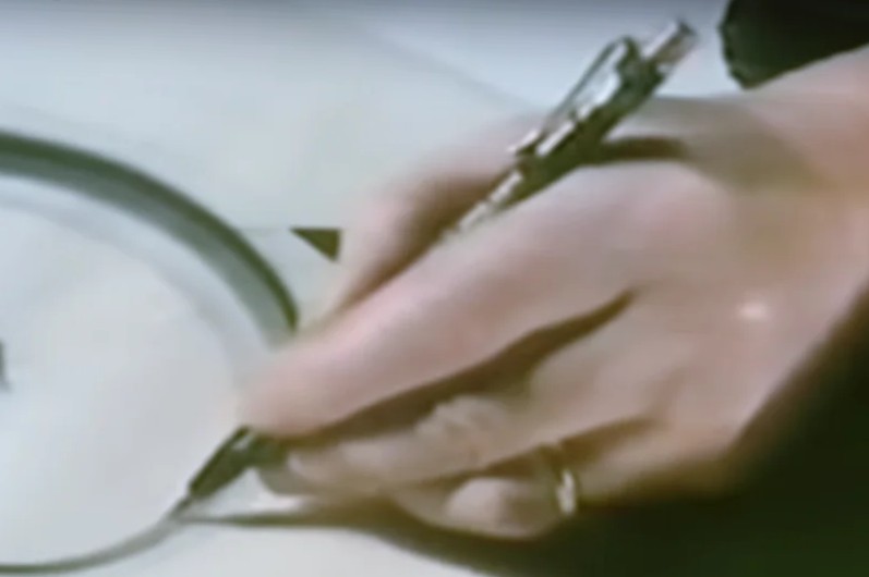 Video still of Escher's hand drawing with leadholder from Adventures in Perception
